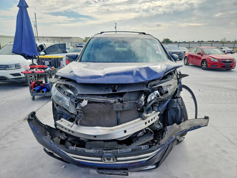 Photo 5 from auction – 2016 HONDA PILOT with VIN 5FNYF6H03GB058415