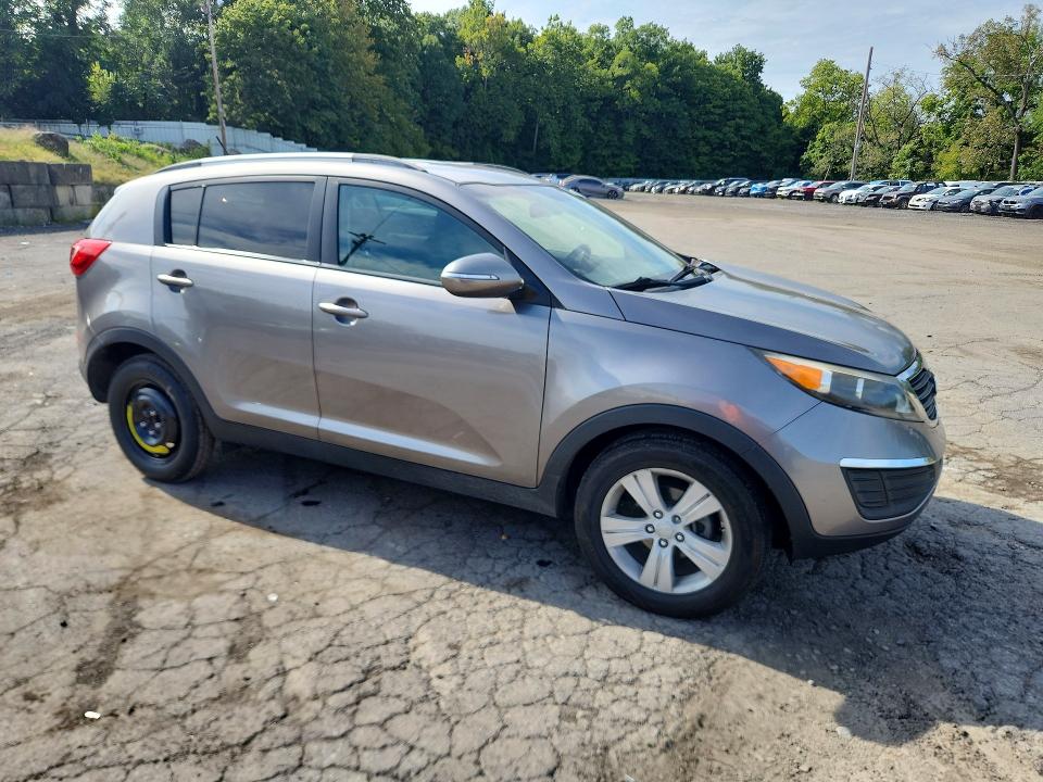 Photo 4 from auction – 2011 KIA SPORTAGE with VIN KNDPB3A21B7061796
