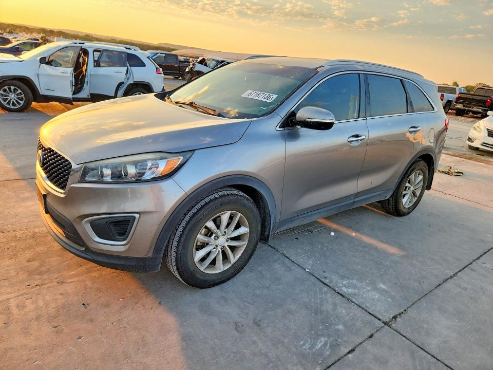 KIA SORENTO 2018 with VIN 5XYPG4A33JG346033 - Photo from auction