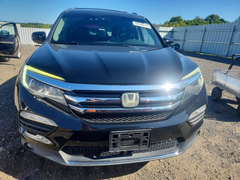 Photo 5 from auction – 2016 HONDA PILOT with VIN 5FNYF6H09GB063232
