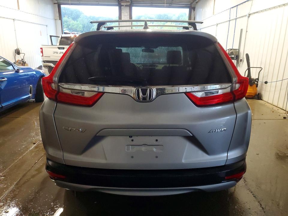 Photo 6 from auction – 2019 HONDA CR-V with VIN 5J6RW2H50KL009696