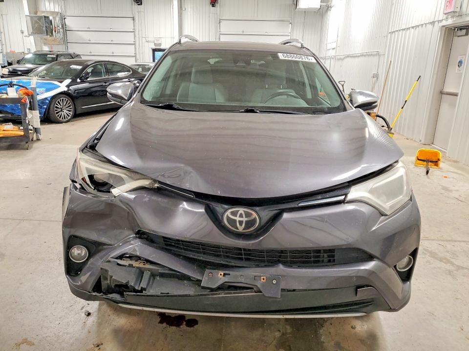 Снимка 5 от търг – 2018 TOYOTA RAV4 с VIN 2T3RFREV9JW742716