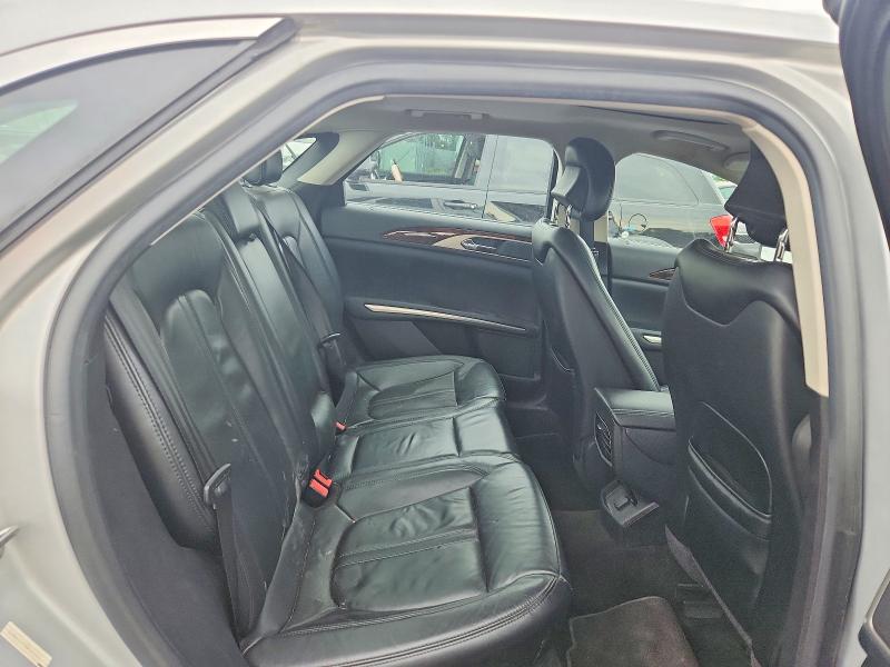 Снимка 10 от търг – 2016 LINCOLN MKZ с VIN 3LN6L2G97GR601283