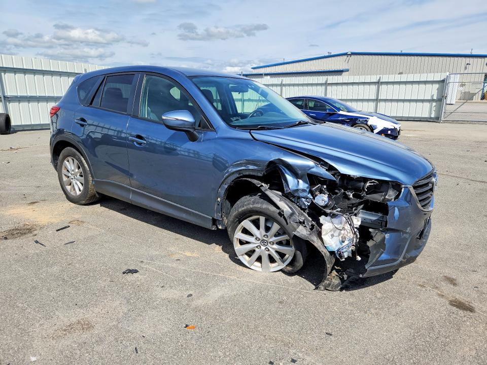 Photo 4 from auction – 2016 MAZDA CX-5 with VIN JM3KE2CY7G0847607