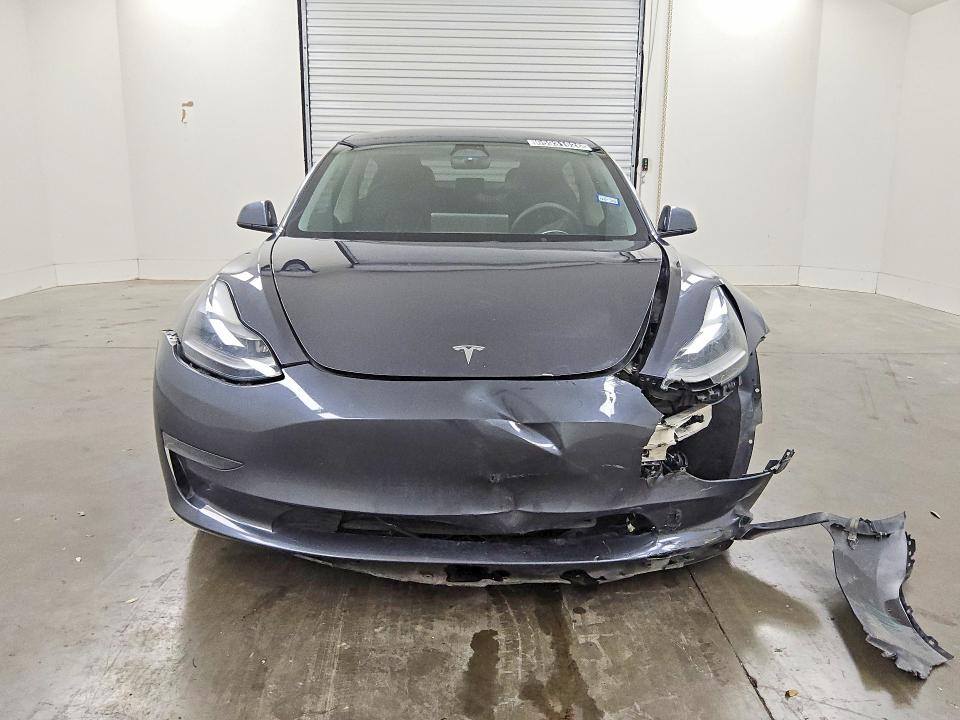 Снимка 5 от търг – 2023 TESLA MODEL 3 с VIN 5YJ3E1EA1PF696868