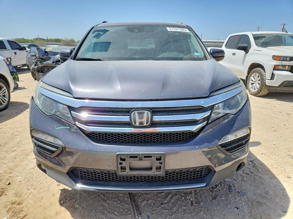 Photo 5 from auction – 2018 HONDA PILOT with VIN 5FNYF5H9XJB001340
