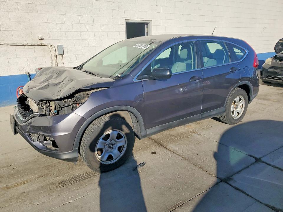HONDA CR-V 2015 with VIN 2HKRM4H30FH696355 - Photo from auction