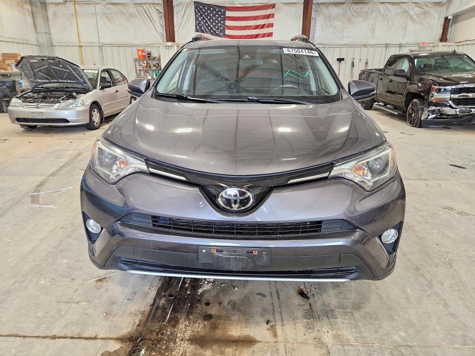 Photo 5 from auction – 2017 TOYOTA RAV4 with VIN JTMRFREV7HJ117479