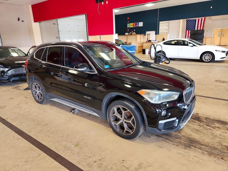 Photo 4 from auction – 2016 BMW X1 with VIN WBXHT3Z31G4A49001