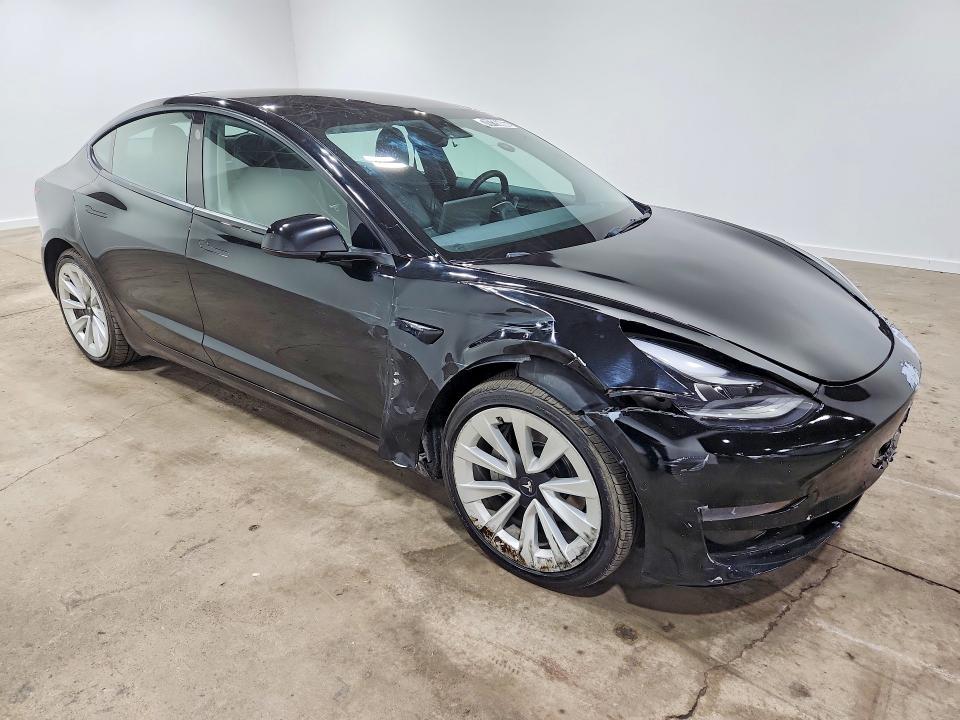 Photo 4 from auction – 2022 TESLA MODEL 3 with VIN 5YJ3E1EA2NF304462