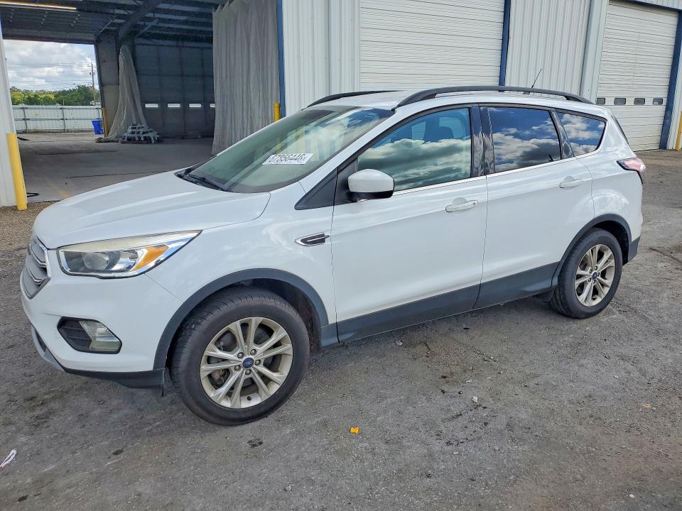 FORD ESCAPE 2018 with VIN 1FMCU9GDXJUC04020 - Photo from auction