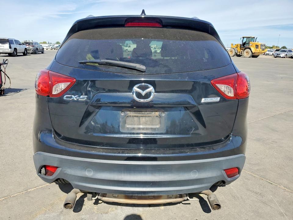 Photo 6 from auction – 2014 MAZDA CX-5 with VIN JM3KE2DY3E0353479