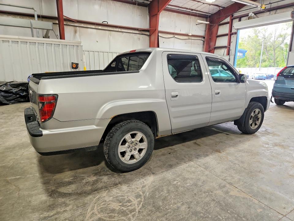 Photo 3 from auction – 2013 HONDA RIDGELINE with VIN 5FPYK1F43DB003843