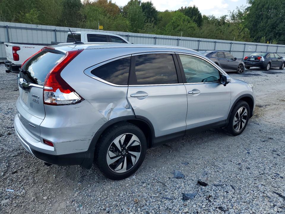 Photo 3 from auction – 2016 HONDA CR-V with VIN 5J6RM4H92GL015463