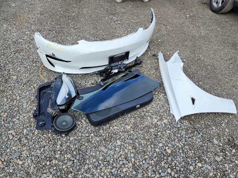 Photo 12 from auction – 2019 TESLA MODEL 3 with VIN 5YJ3E1EB2KF441325