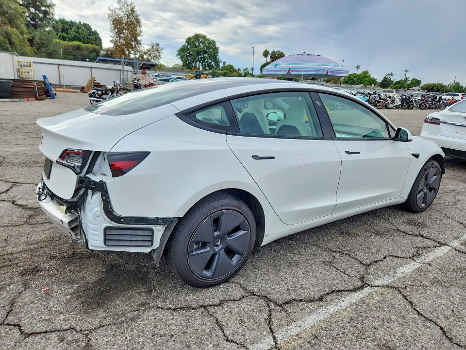 Photo 3 from auction – 2022 TESLA MODEL 3 with VIN 5YJ3E1EAXNF134223