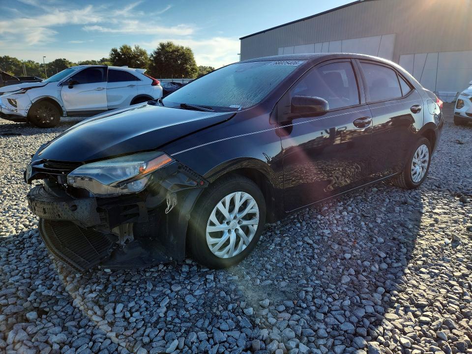 TOYOTA COROLLA 2017 with VIN 5YFBURHE6HP727355 - Photo from auction
