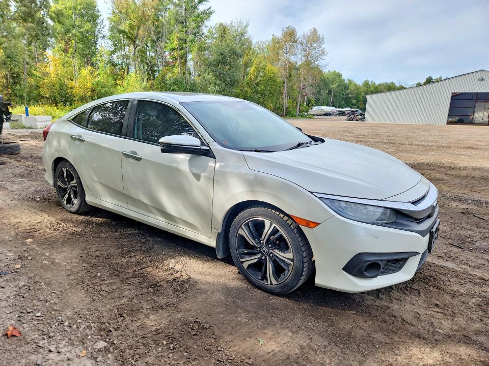 Photo 4 from auction – 2016 HONDA CIVIC with VIN 2HGFC1F94GH102213
