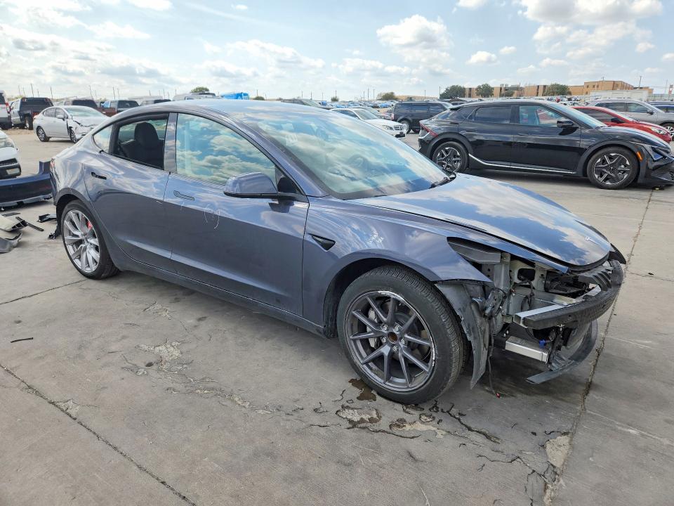 Photo 4 from auction – 2023 TESLA MODEL 3 with VIN 5YJ3E1EA0PF710498