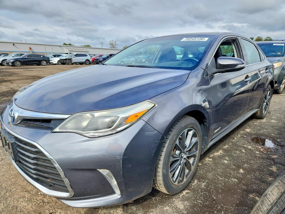 TOYOTA AVALON HYBRID 2016 with VIN 4T1BD1EB8GU054061 - Photo from auction