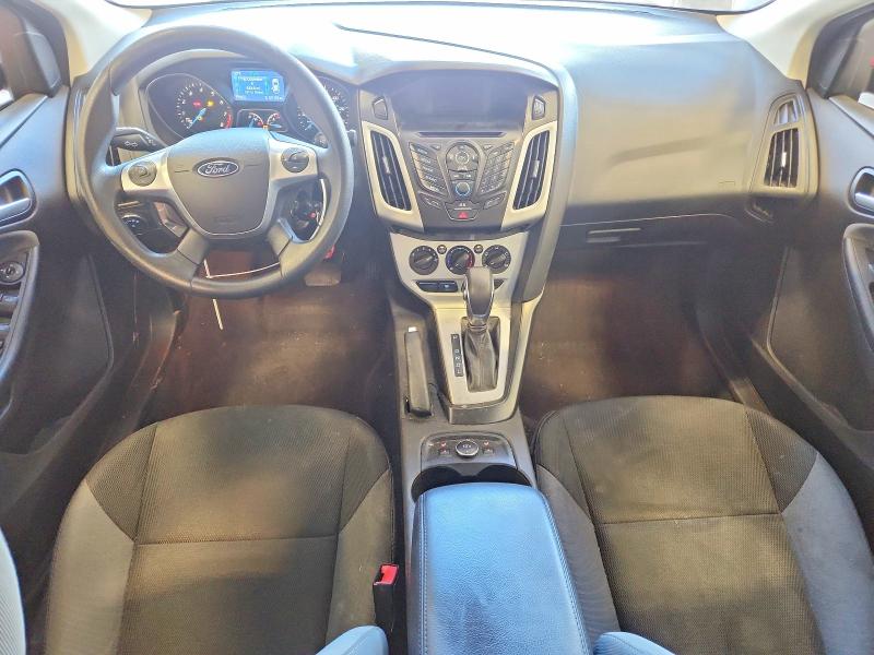 Photo 8 from auction – 2014 FORD FOCUS with VIN 1FADP3F23EL280290
