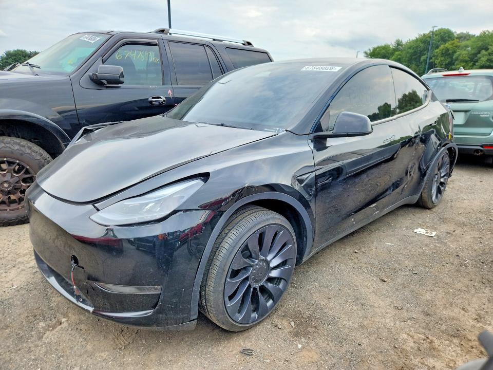 TESLA MODEL Y 2024 z numerem VIN 7SAYGDEF9RA299280 - Zdjęcie z aukcji