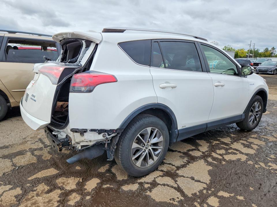 Photo 3 from auction – 2016 TOYOTA RAV4 HV with VIN JTMRJREV9GD057927