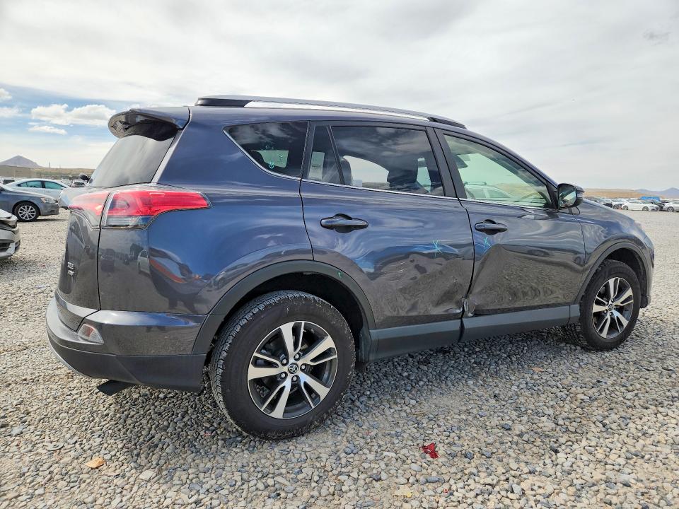 Photo 3 from auction – 2018 TOYOTA RAV4 with VIN JTMRFREV6JJ720297