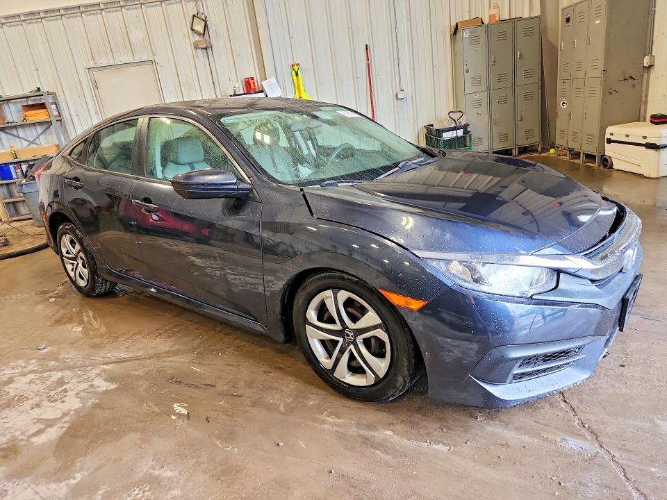 Photo 4 from auction – 2018 HONDA CIVIC with VIN 19XFC2F58JE040206
