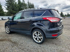 Photo 2 from auction – 2014 FORD ESCAPE with VIN 1FMCU9J99EUC20204