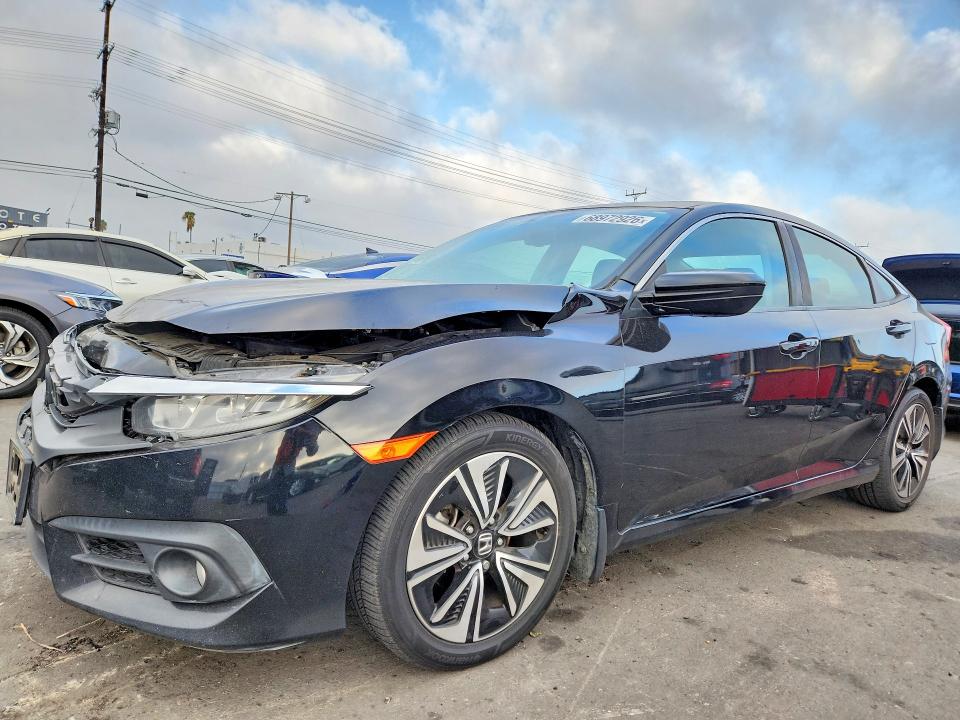 HONDA CIVIC 2017 with VIN 2HGFC1F72HH641428 - Photo from auction