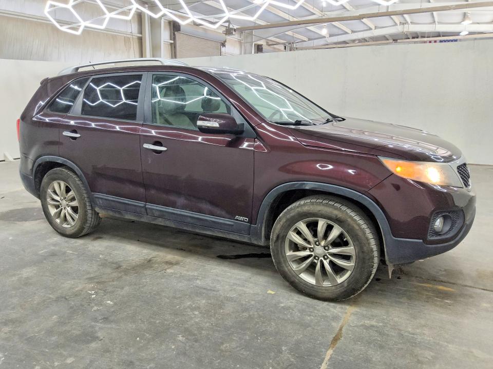 Foto 4 de la subasta – 2011 KIA SORENTO con VIN 5XYKUDA25BG044982