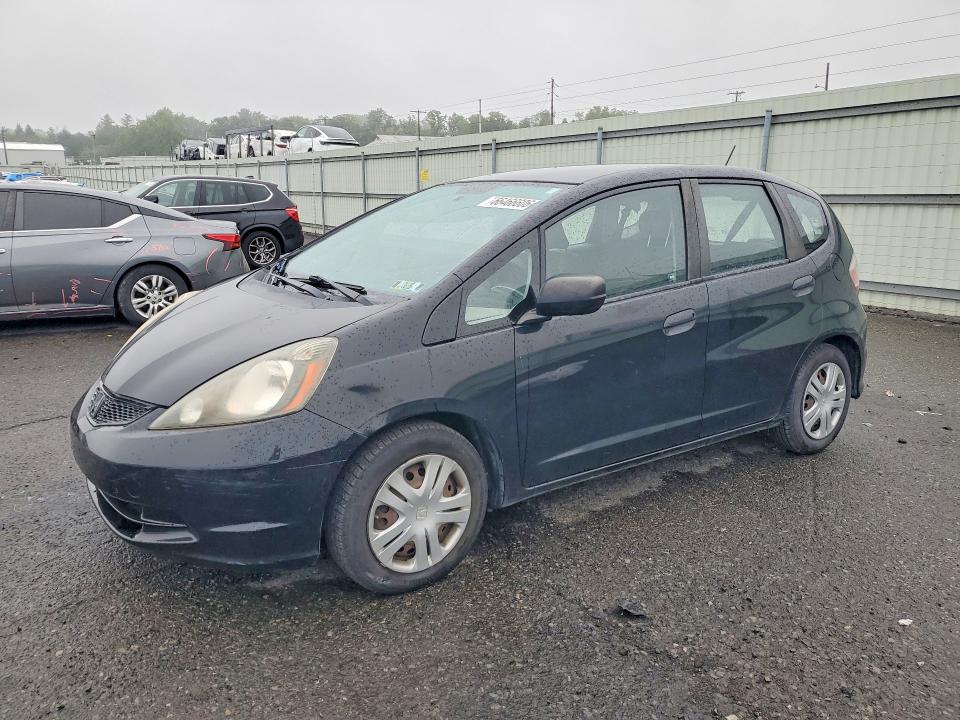 HONDA FIT 2009 with VIN JHMGE88239S013197 - Photo from auction