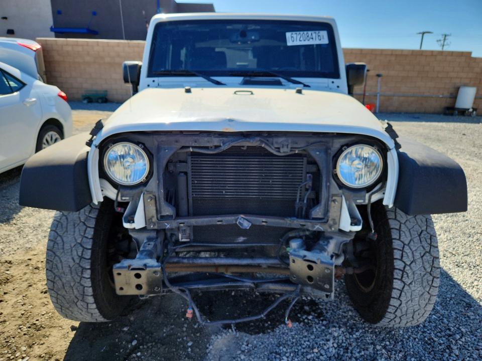 Photo 5 from auction – 2016 JEEP WRANGLER with VIN 1C4AJWAG5GL231498