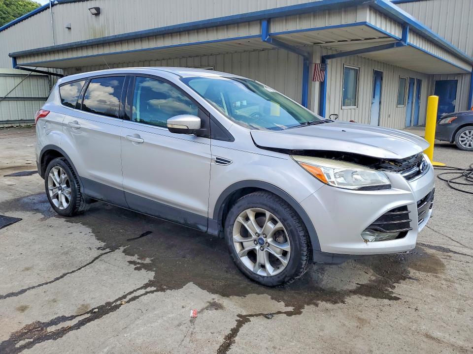 Photo 4 from auction – 2013 FORD ESCAPE with VIN 1FMCU9H92DUD93342