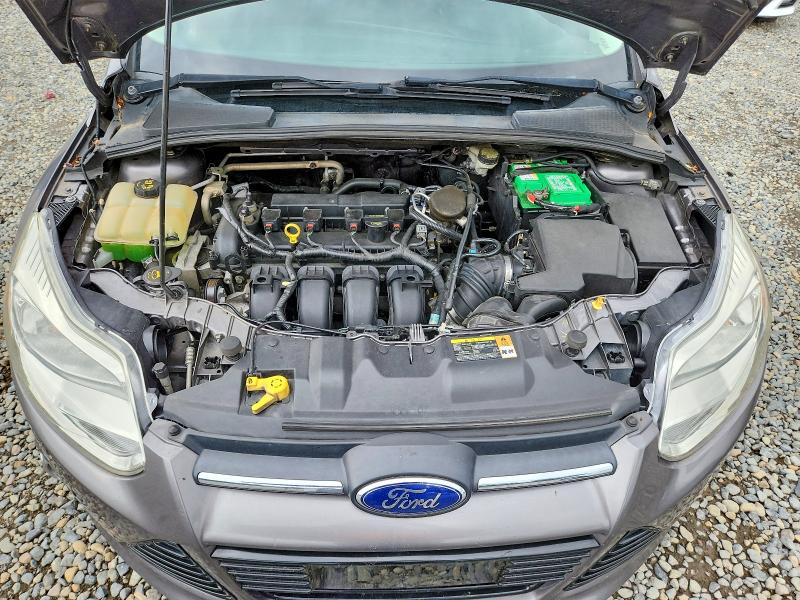 Снимка 11 от търг – 2014 FORD FOCUS с VIN 1FADP3N20EL238046