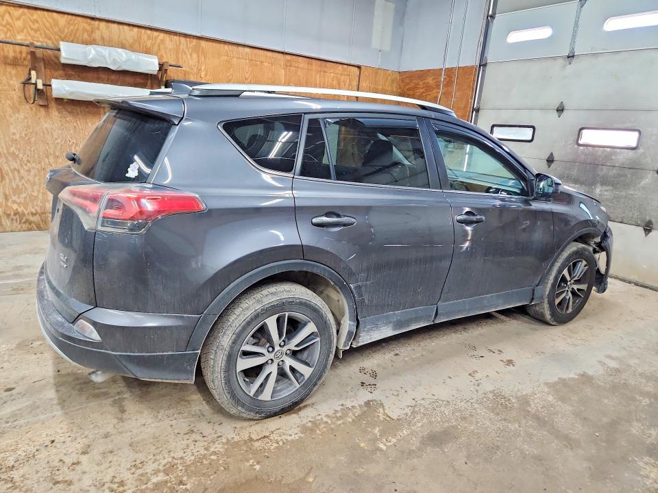 Photo 3 from auction – 2016 TOYOTA RAV4 with VIN 2T3RFREV6GW437764
