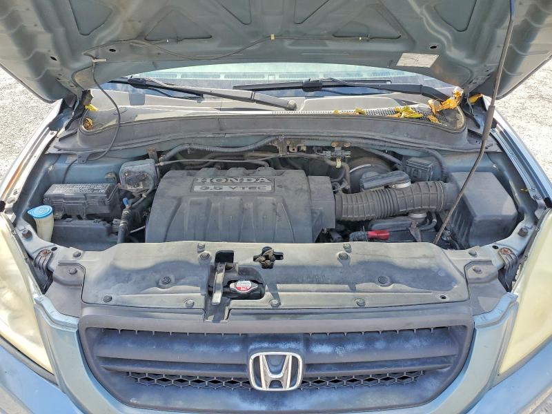Photo 12 from auction – 2005 HONDA PILOT with VIN 2HKYF18475H517126