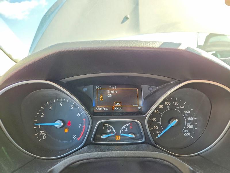Photo 9 from auction – 2015 FORD FOCUS with VIN 1FADP3F2XFL320253