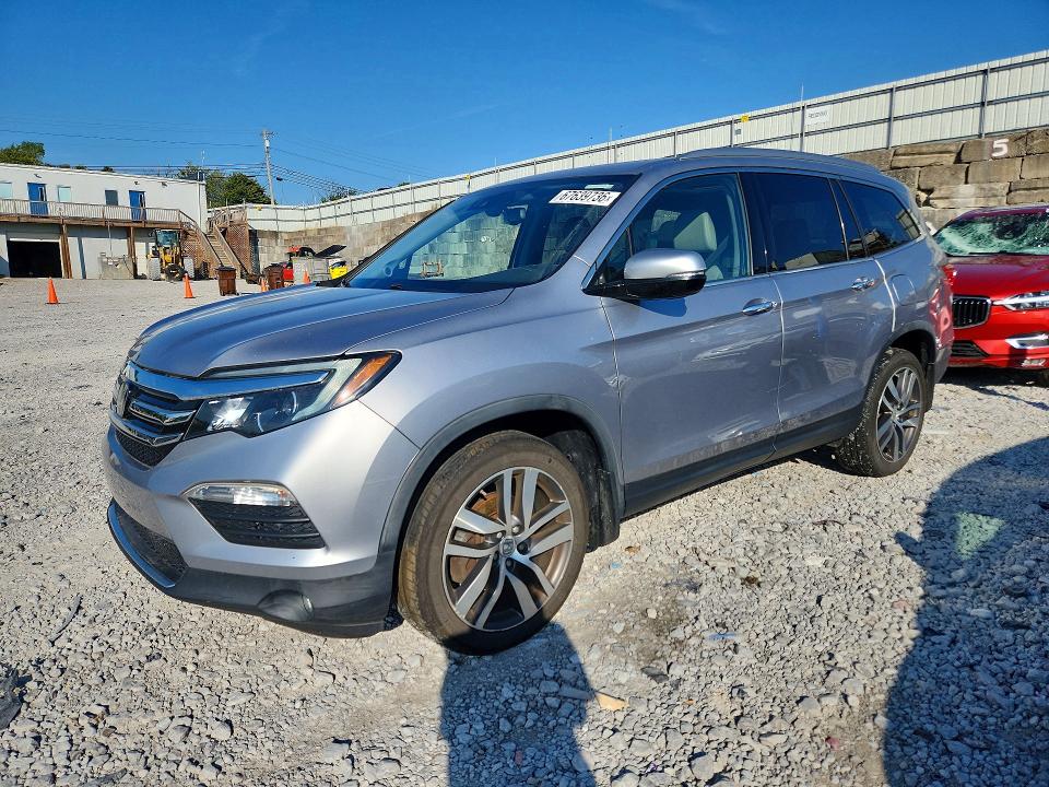 HONDA PILOT 2016 с VIN 5FNYF6H03GB122968 - Фото с аукциона