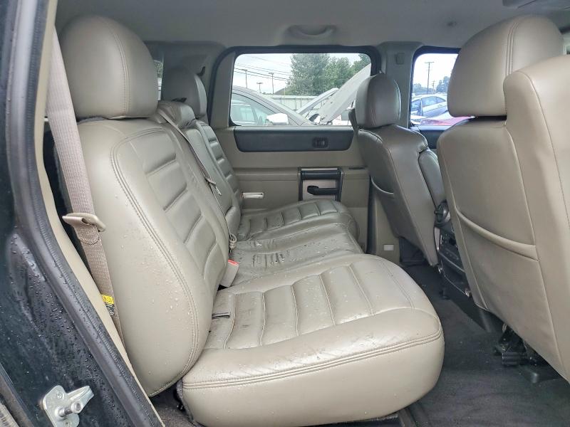 Photo 11 from auction – 2004 HUMMER H2 with VIN 5GRGN23U24H100200