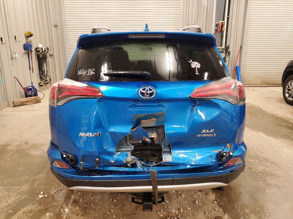 Photo 6 from auction – 2016 TOYOTA RAV4 HV with VIN JTMRJREV9GD023745