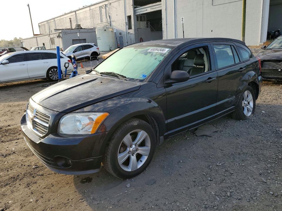 DODGE CALIBER 2010 with VIN 1B3CB9HB9AD639149 - Photo from auction