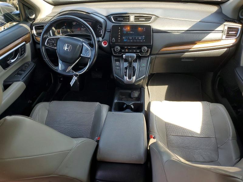 Photo 8 from auction – 2017 HONDA CR-V with VIN 2HKRW1H90HH506618