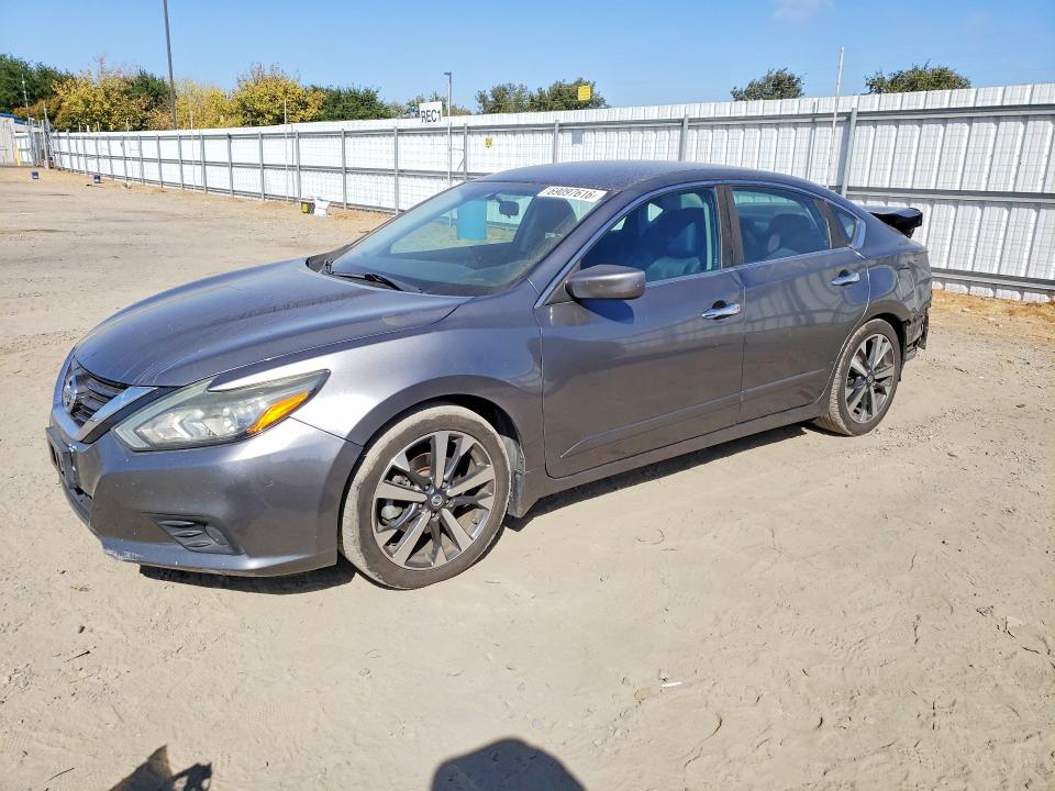 NISSAN ALTIMA 2017 with VIN 1N4AL3AP0HC284058 - Photo from auction