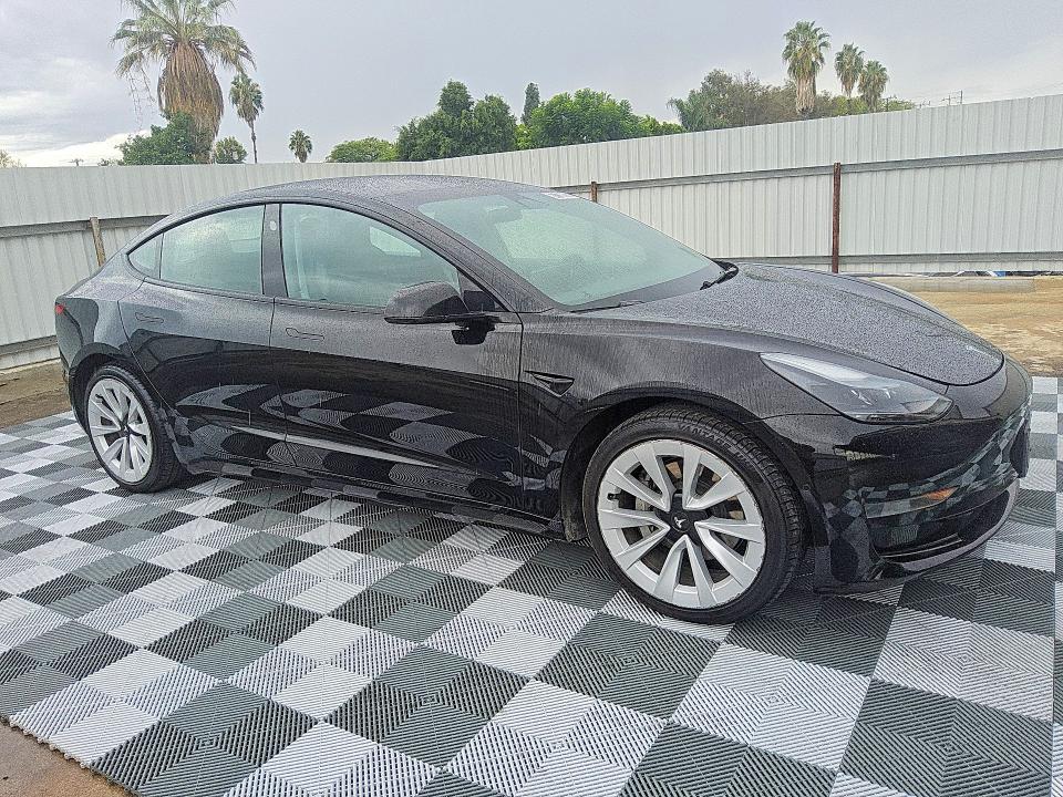 Photo 4 from auction – 2022 TESLA MODEL 3 with VIN 5YJ3E1EA7NF190491