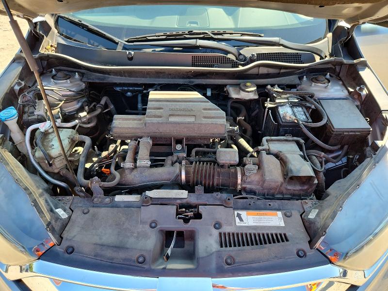 Photo 12 from auction – 2018 HONDA CR-V with VIN 7FARW1H53JE038048