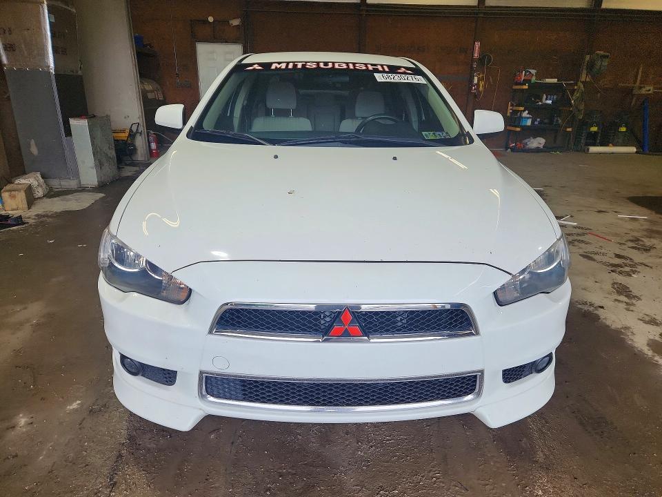 Photo 5 from auction – 2012 MITSUBISHI LANCER with VIN JA32V2FWXCU018440