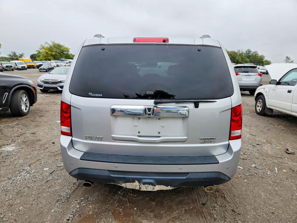 Снимка 6 от търг – 2012 HONDA PILOT с VIN 5FNYF4H98CB055975