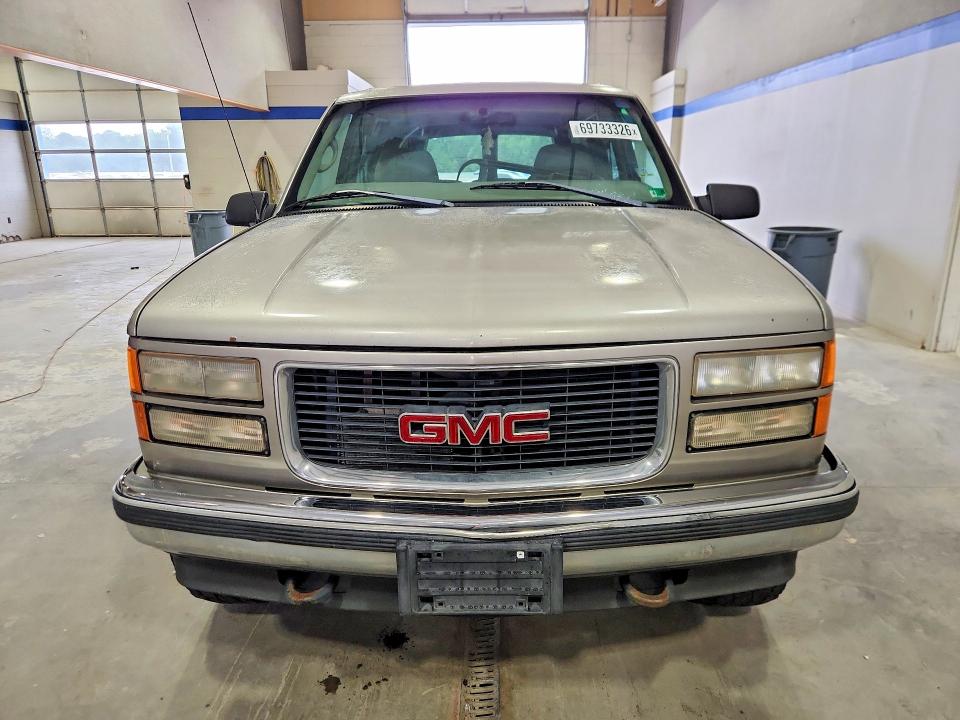 Photo 5 from auction – 1999 GMC SUBURBAN with VIN 1GKFK16R1XJ707097
